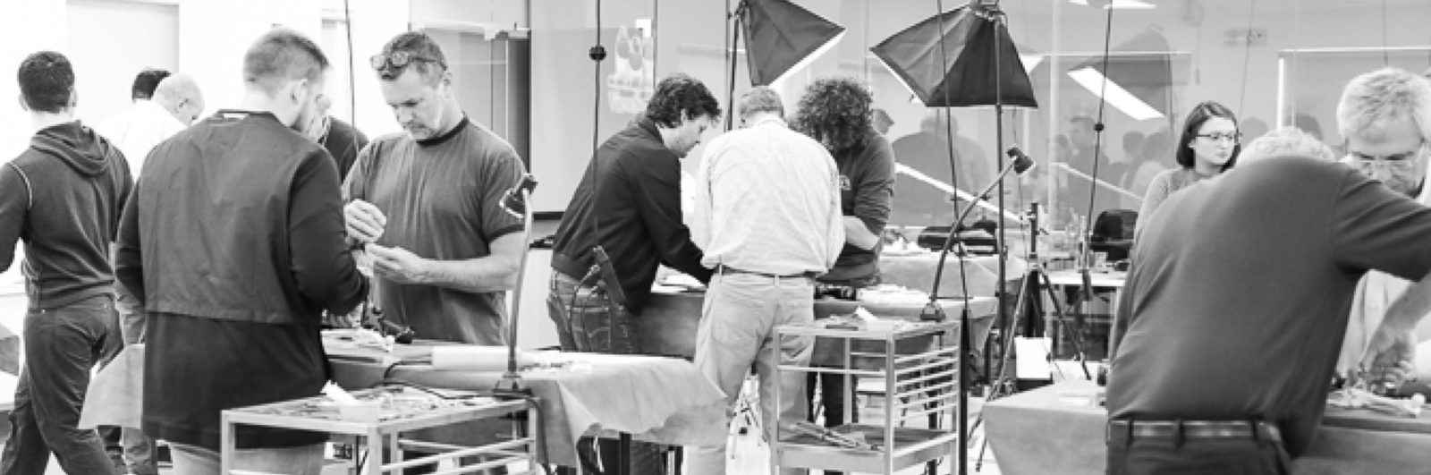 People taking a veterinary training course in a dry lab